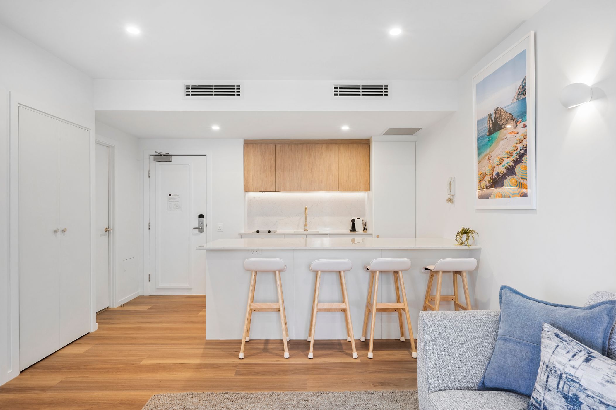 Renovated kitchen with marbled kitchen island